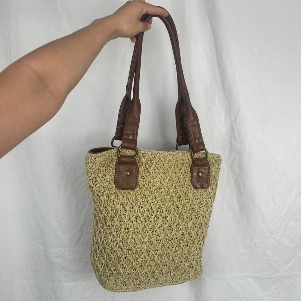 green crochet tote styled shoulder bag with brown leather straps